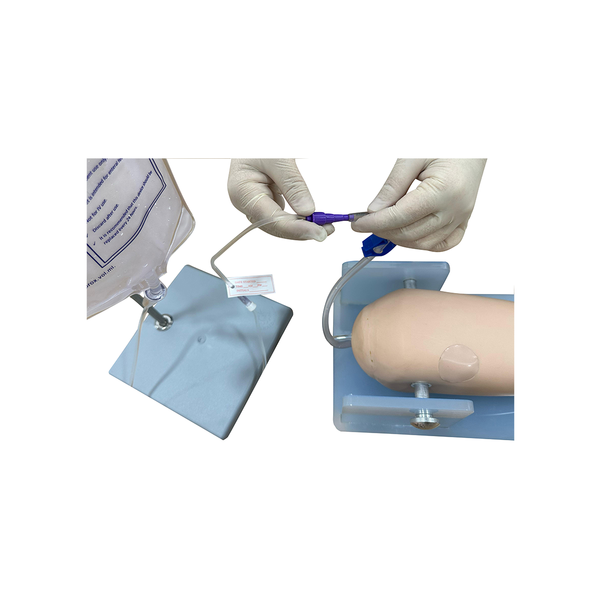 st155-2 Pediatric IO training leg showing tibia needle insertion and bone marrow aspiration
